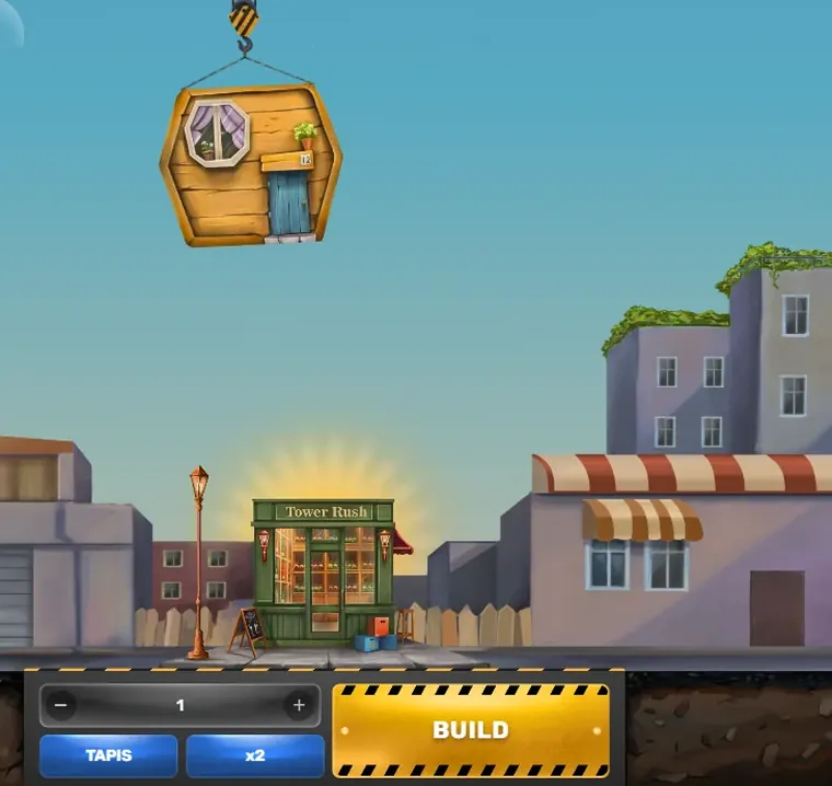Le jeu Tower Rush : la grue descend un étage en bois au-dessus de la boutique Tower Rush, au milieu de la rue, barre de mise et bouton BUILD en bas
